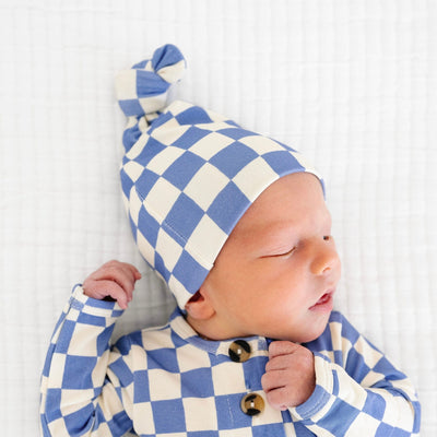 jett top knot hat newborn boy cropped image close up on hat