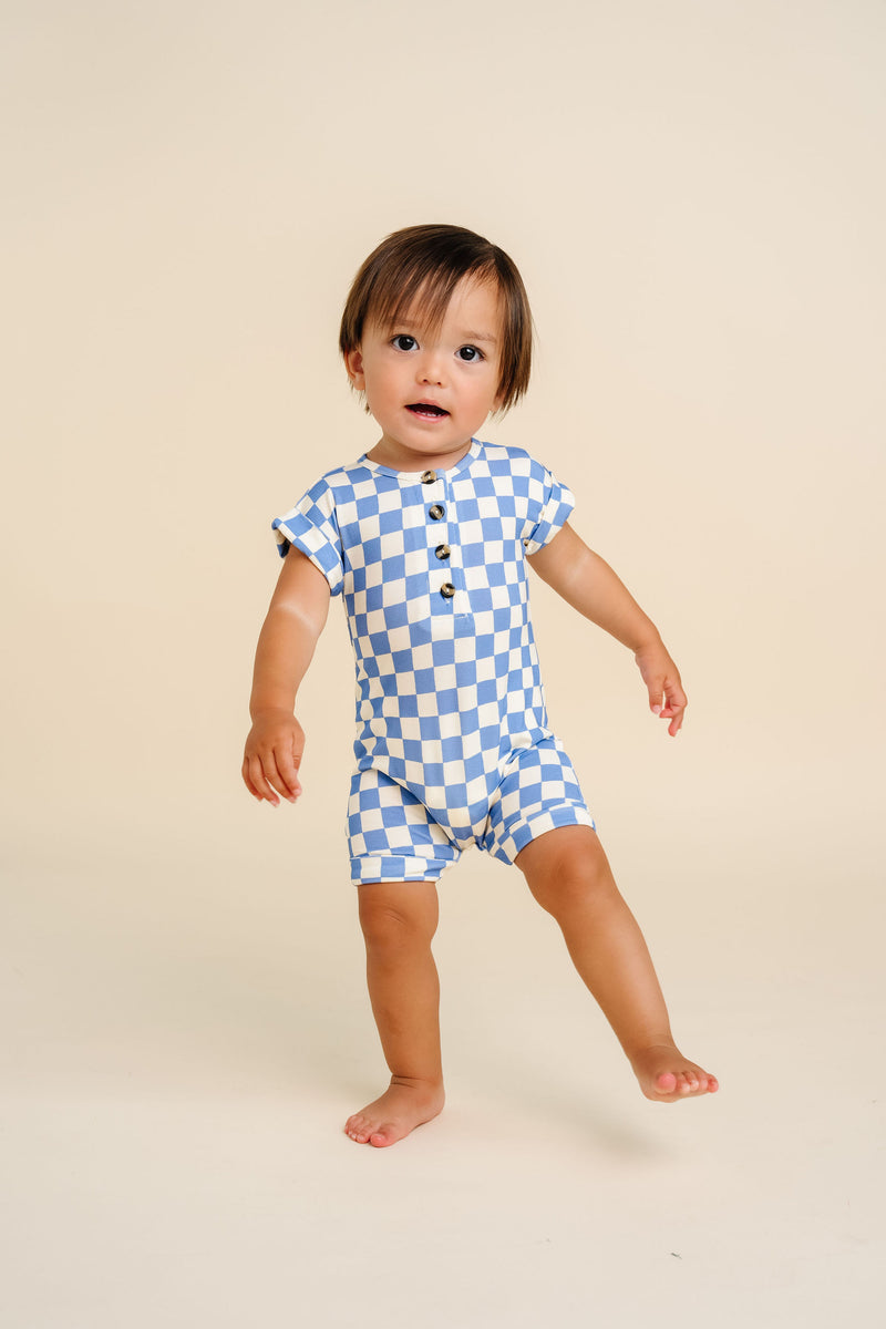 jett romper toddler boy - standing and smiling at camera