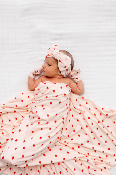 junie strawberry headband bundle. swaddle, knit headband, and mitten newborn girl