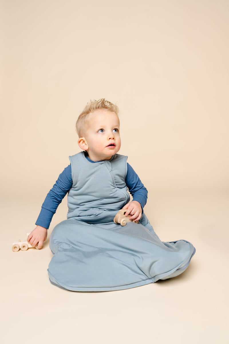 leo sleep sack toddler sitting down wearing 2t size