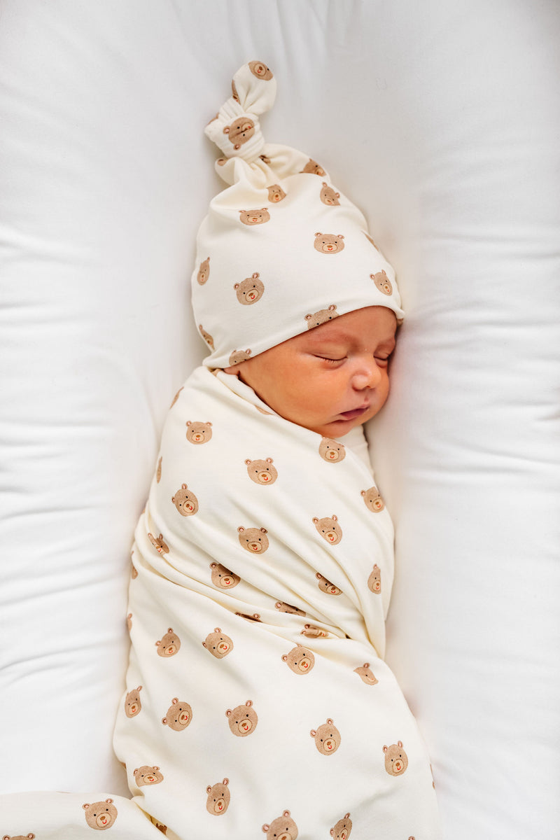 teddy swaddle blanket newborn boy close up on bear print